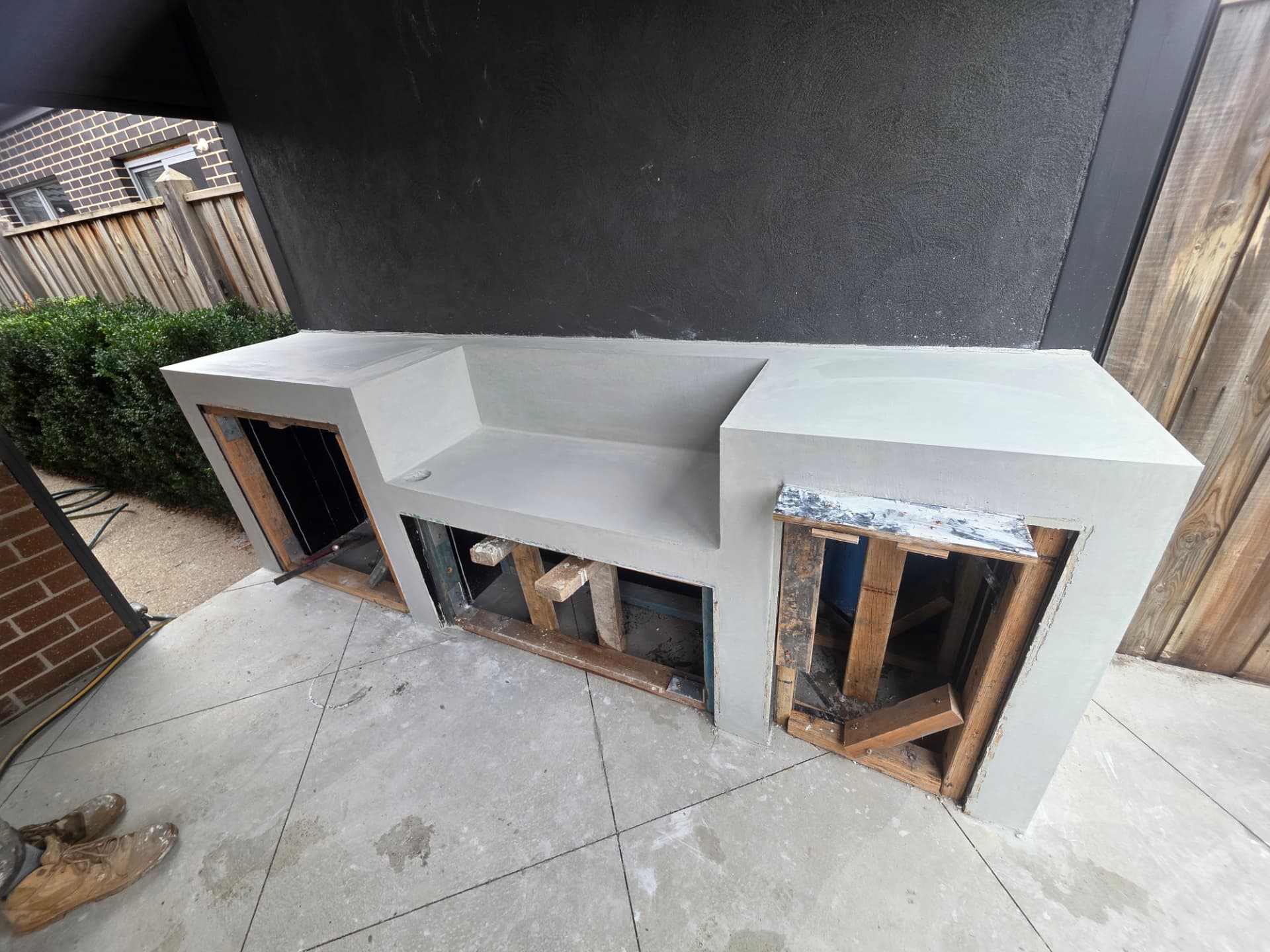Concrete outdoor kitchen & bench — Essendon